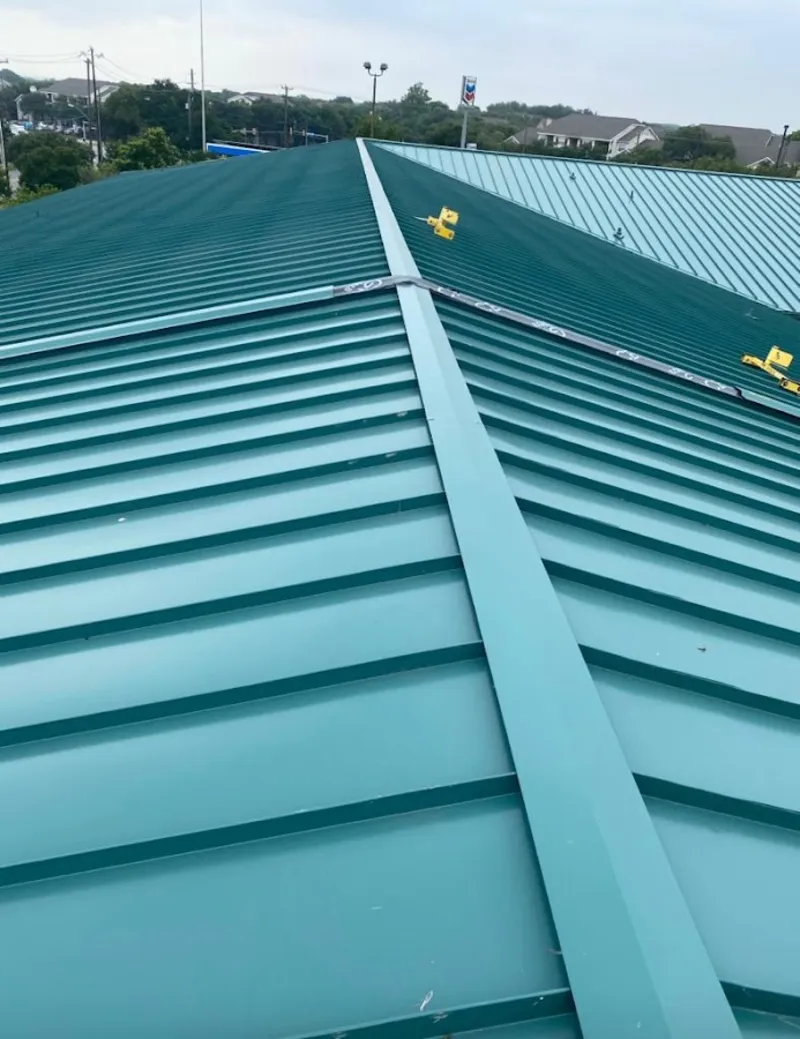 Green commercial metal roof ridge and valley for Metal Roof Repair in Liberal
